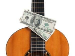 Dollars and guitars.