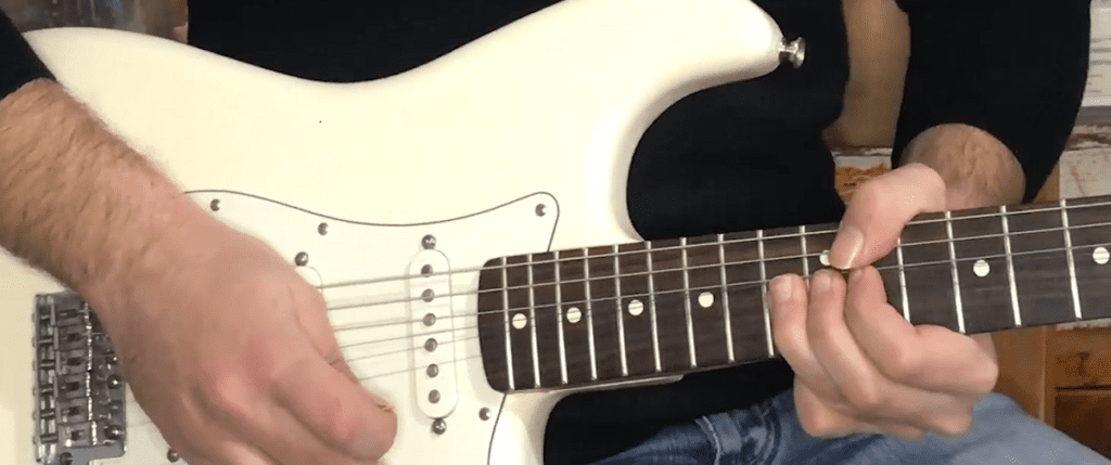 Guitar string bending technique
